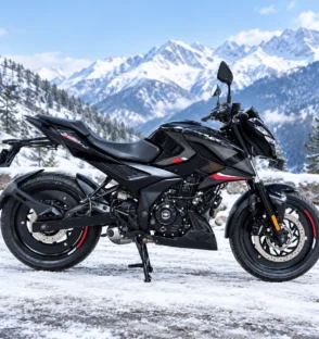 Used Bike Black Motorcycle in a Snowy Alpine Pass 1 - Winloo